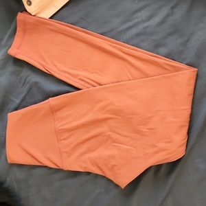 Born primitive burnt sienna leggings size small